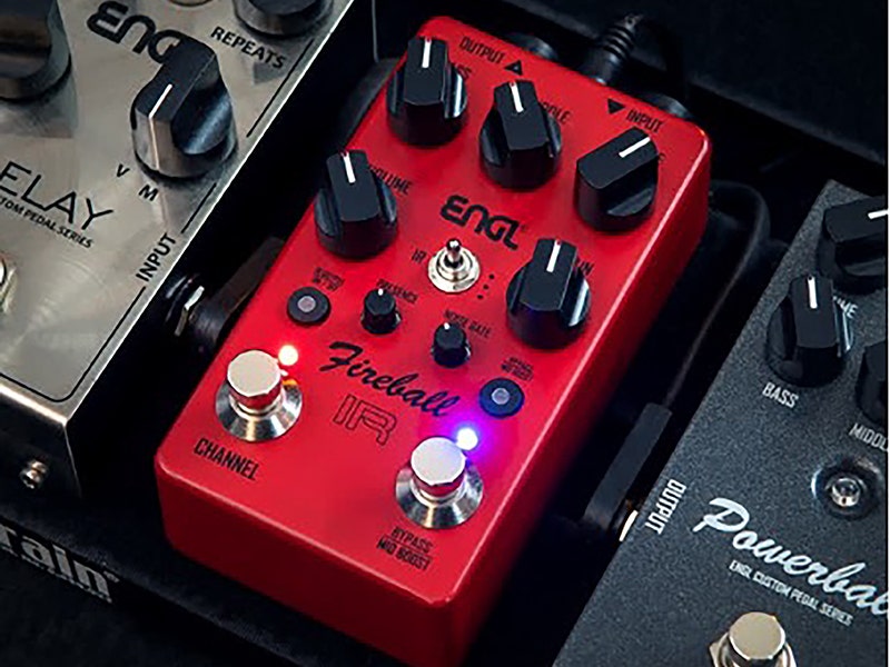 ENGL Fireball IR red guitar effects pedal with multiple knobs, toggle switch, and footswitches on a pedalboard