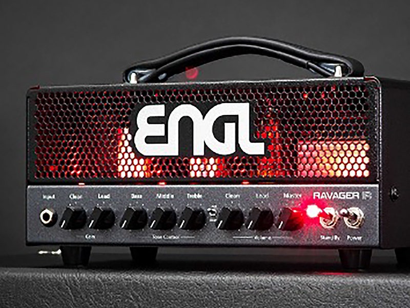 ENGL Ravager IR guitar amplifier head with red glowing tubes, black chassis, and control knobs for gain, tone, and volume