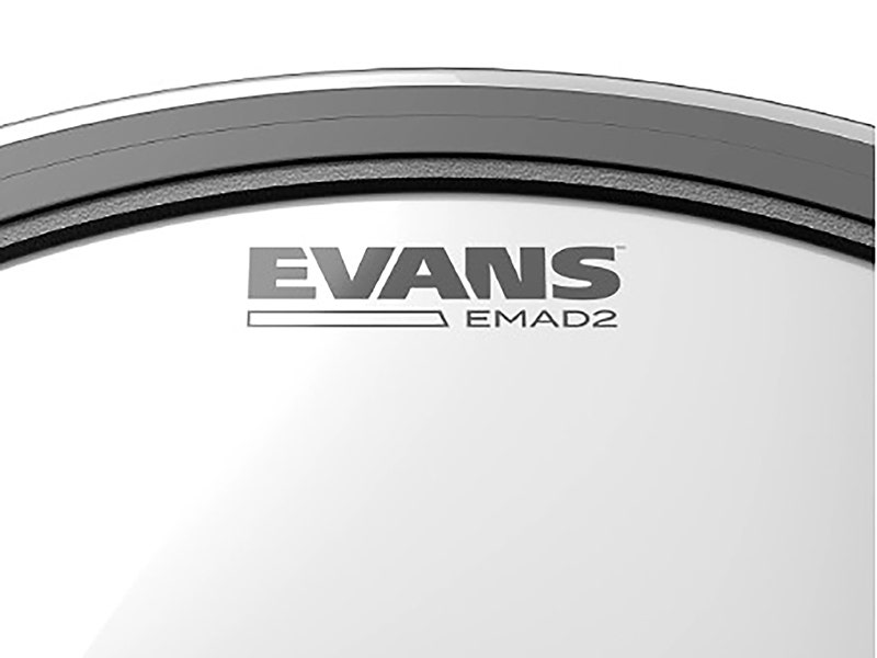 Evans EMAD2 clear bass drum head with black dampening ring and chrome hoop on white background