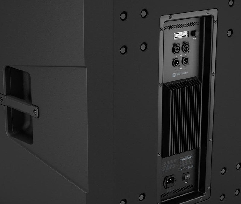 Rear angled view of an LD Systems ICOA 18A powered subwoofer showing control panel, cooling vents, and side carry handles.