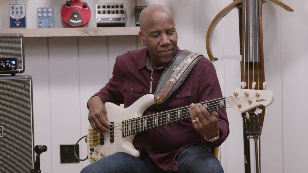 Nathan East playing electric bass through his Signature Laney Digbeth bass amp head at American Musical Supply