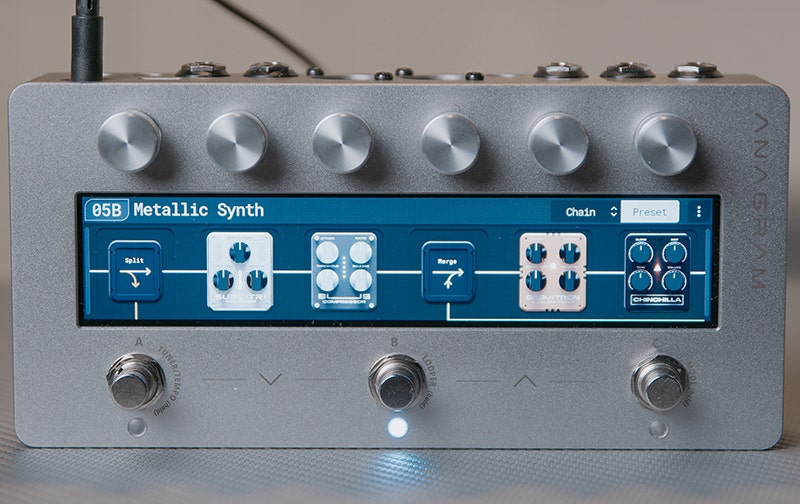 Darkglass bass preamp pedal with touchscreen display showing EQ controls, including bass, midrange, and treble