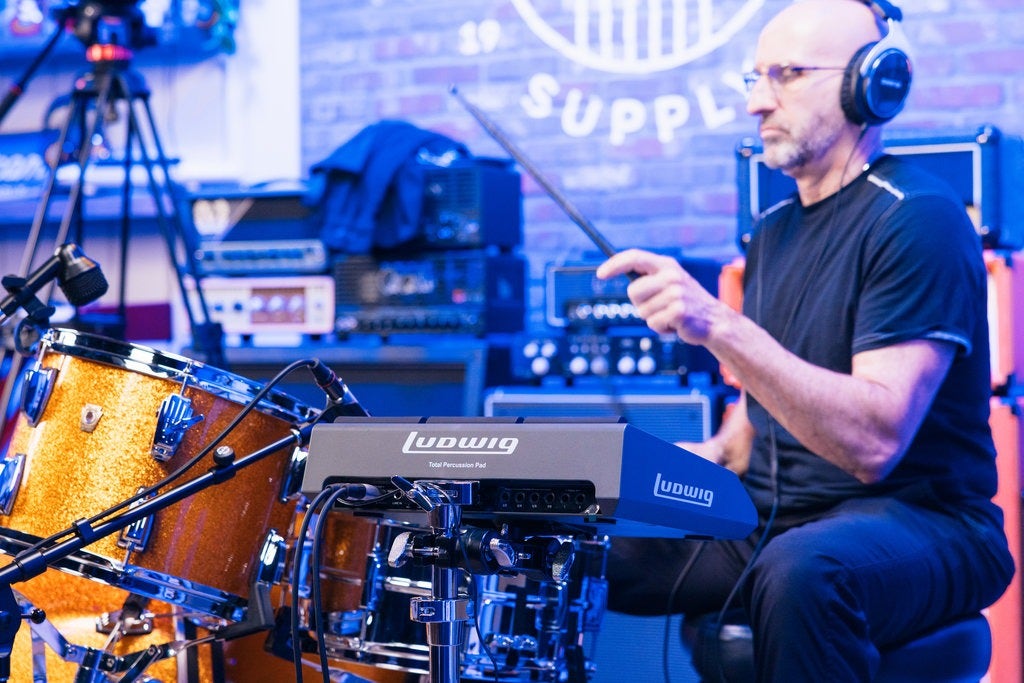 Photo of a drummer playing