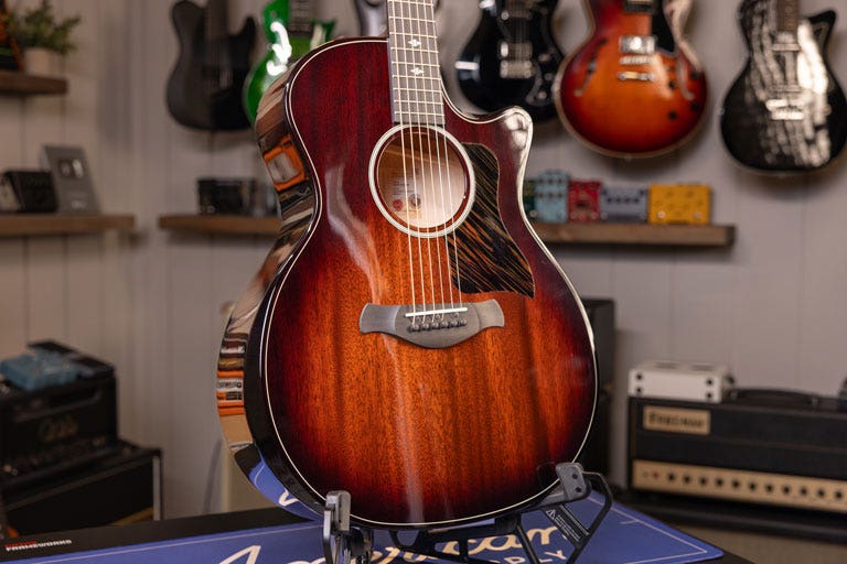 Photo of a Taylor grand auditorium acoustic guitar in the AMS studio