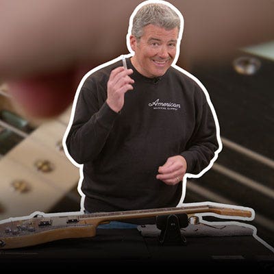 Ryan from AMS about to demonstrate guitar care.