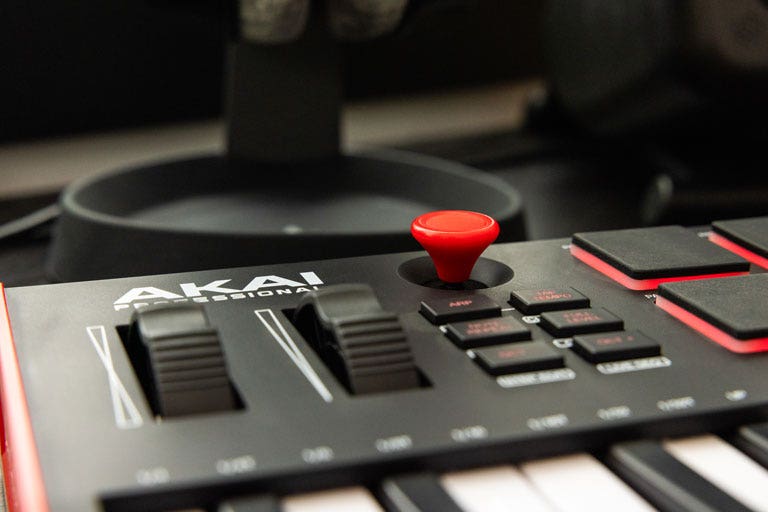 Closeup of an Akai MPK mini plus, front and top view