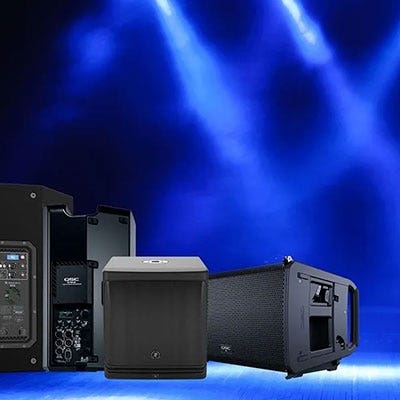 A grouping of active and passive PA speakers.