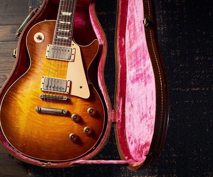 Gibson Les Paul Electric guitar with burst finish in a pink-lined hardshell case