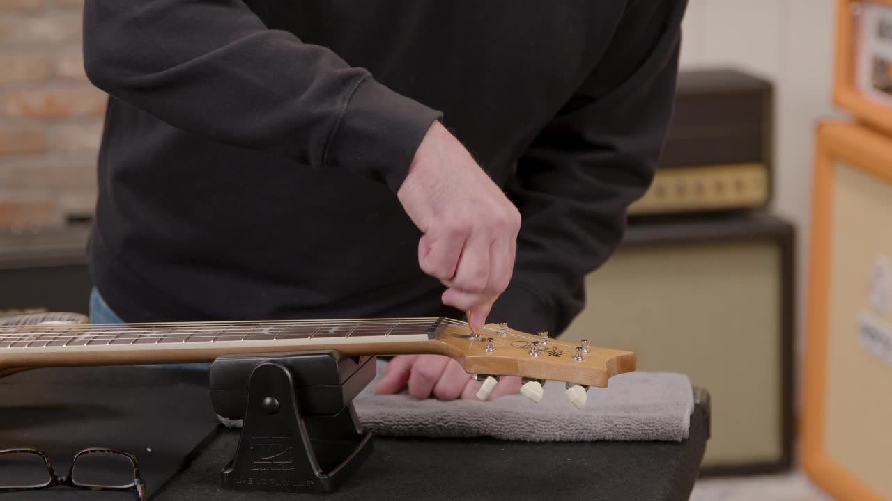 Adjusting the action when unboxing a new guitar AMS