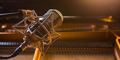 How to Mic a Piano: Piano Microphone Choice and Placement