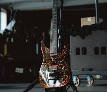 Jackson 7-string on a guitar stand