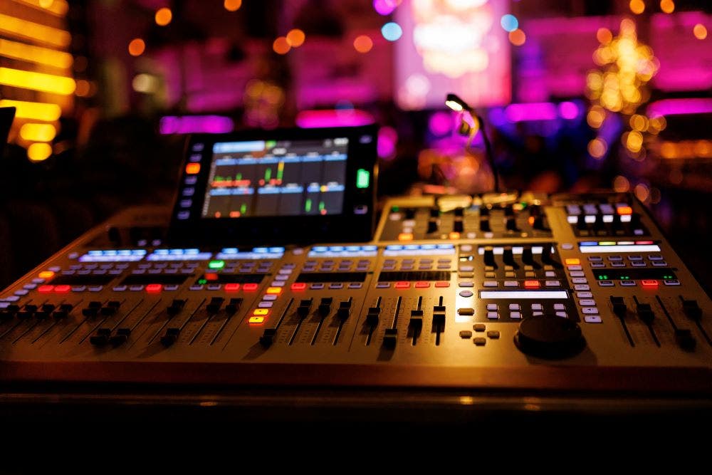 Live sound mixer at venue