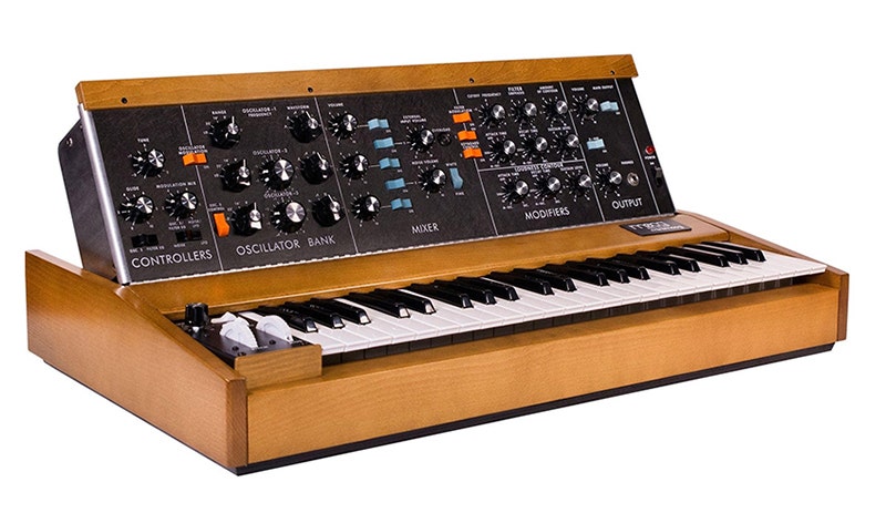 Vintage Moog Minimoog analog synthesizer with wood cabinet